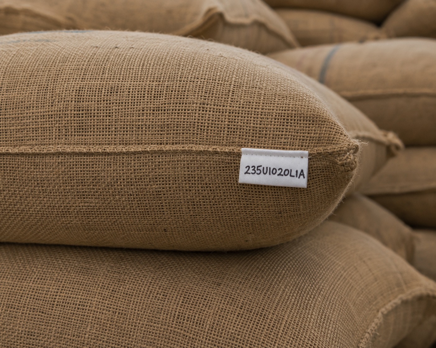 Jute coffee bag with a batch code label